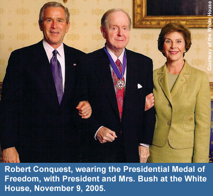 Robert Conquest, wearing the Presidential Medal of Freedom, with President and Mrs. Bush at the White House, November 9, 2005.