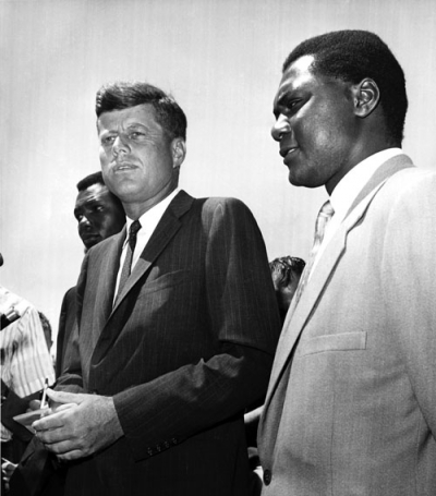 Democratic presidential candidate John F. Kennedy meets with Tom Mboya, right, at Hyannisport in July 1960