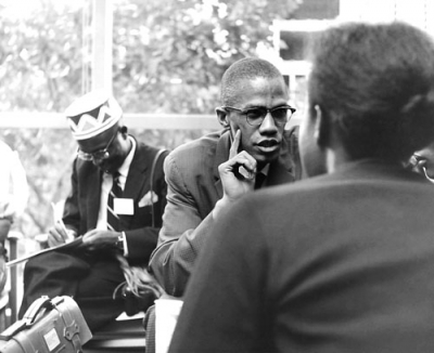 Malcolm X, the public face of the Nation of Islam, talks to the African students in 1960 in New York