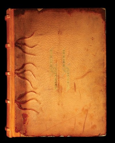 Runes and swastikas decorate the cover of one of Heinrich Himmler’s personal photo albums.