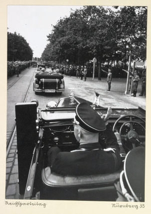 Himmler in a official motorcade, 1935.