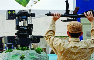 South Korean soldier surrenders to a machinegun- armed robot