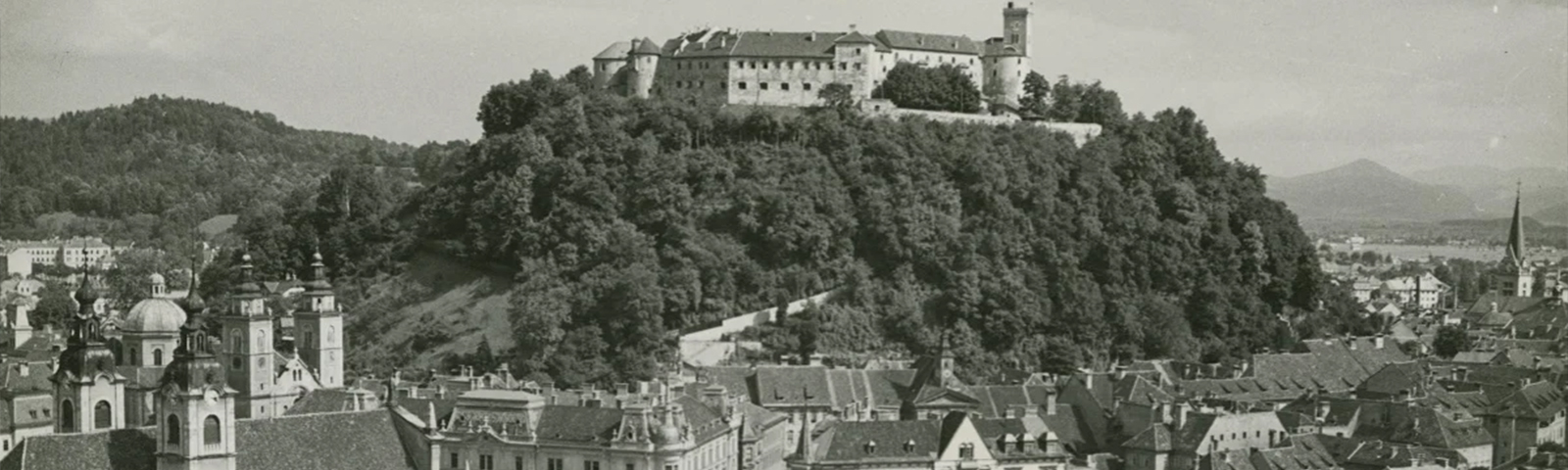 Black and white photograph of a historic European town in the former Yugoslavia