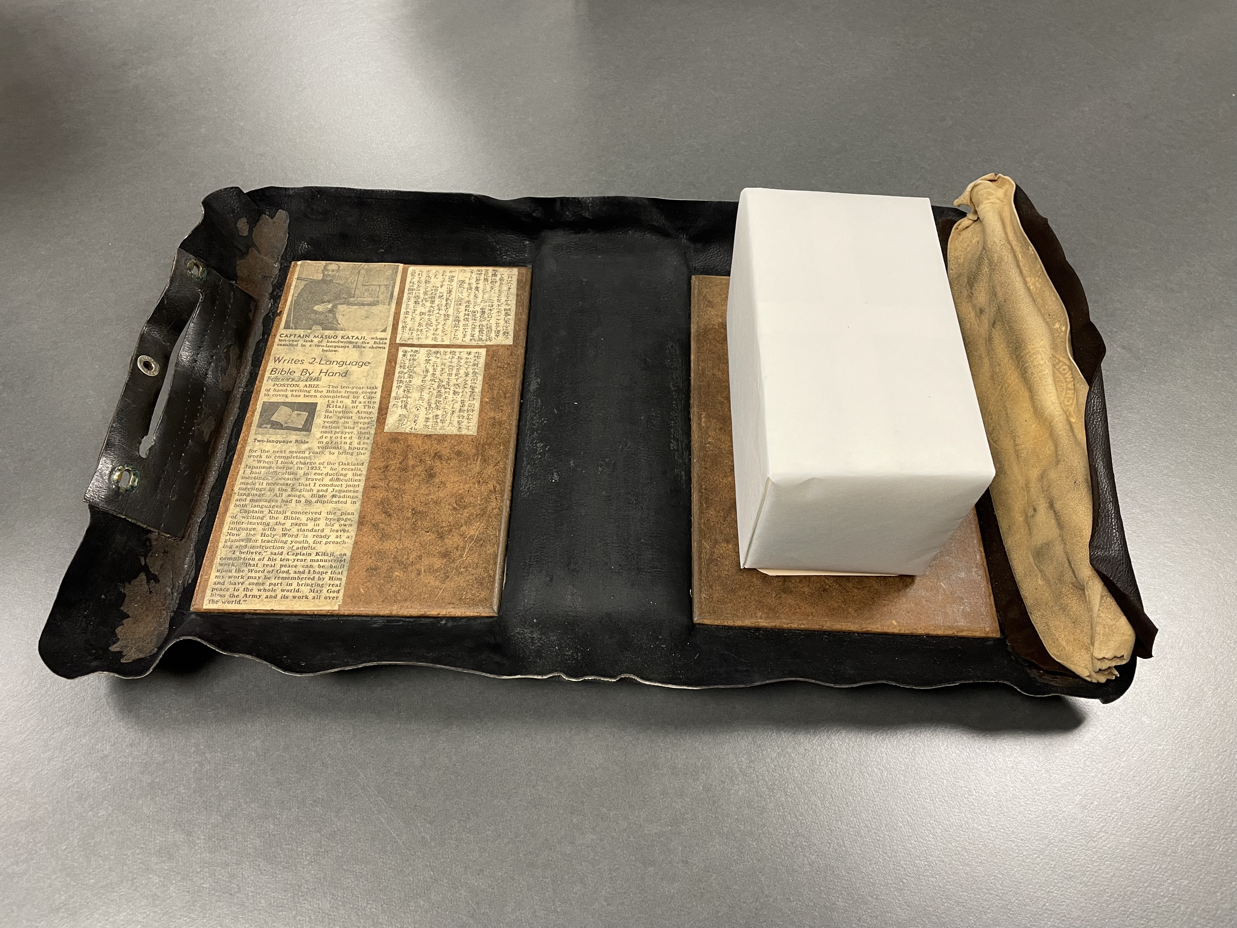 Exhibition compensation blocks fill in the space that Bibles would take up in their outer cases while the books are on display