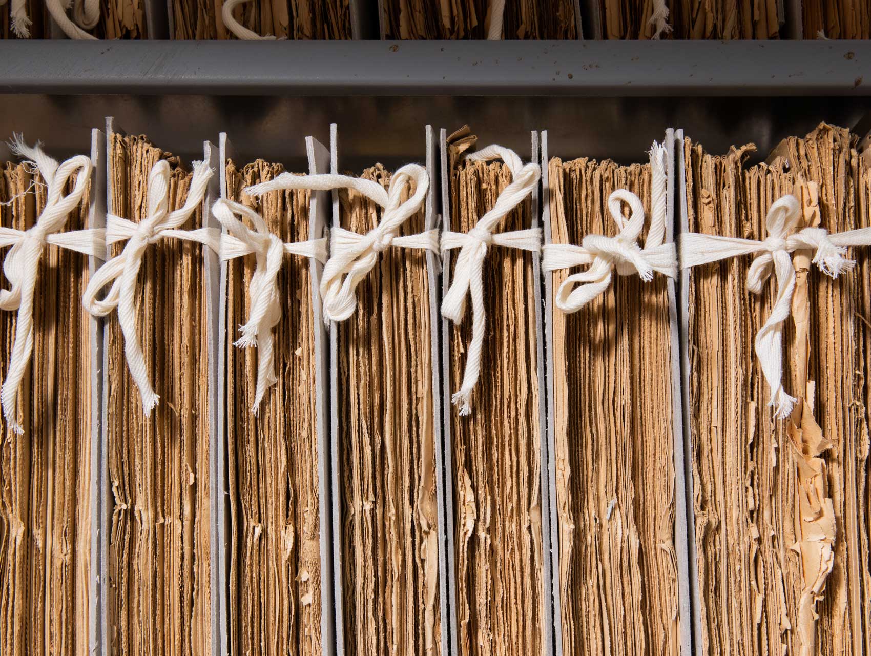 Cotton tied newspapers