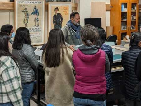 Laurent Cruveillier speaking in front of a group of people