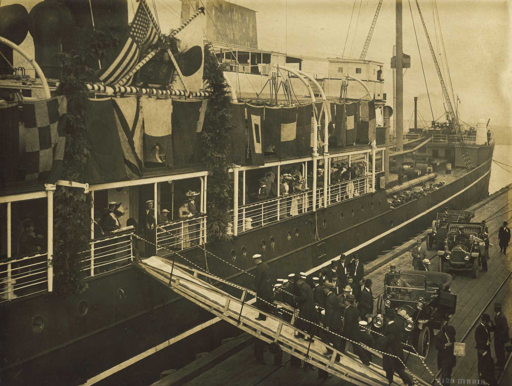 Ship Tanba Maru at port in Seattle. Japanese and American flags.