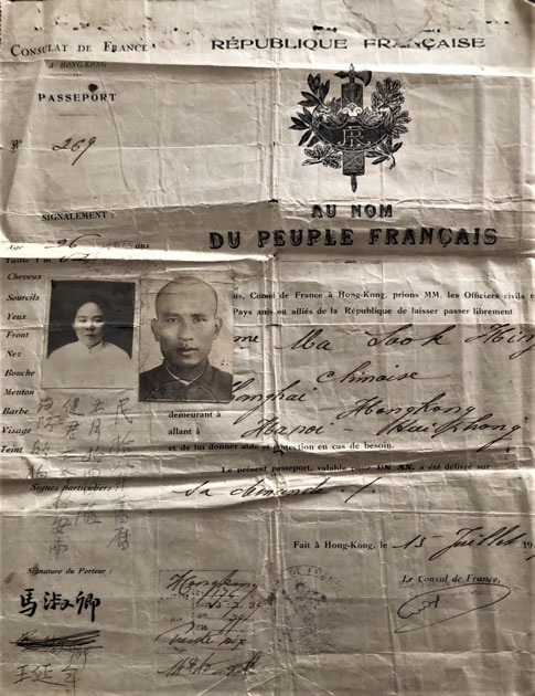 Photo of Pai Ch'ung-hsi passport - fragile paper with photos
