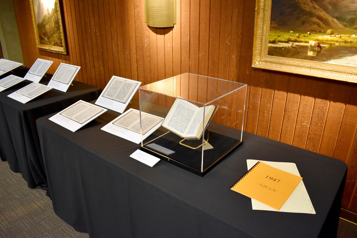 Exhibit of Chiang Ching-kuo diaries on a table with black tablecloth