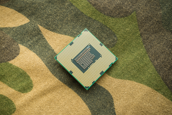 computer chip on camo background