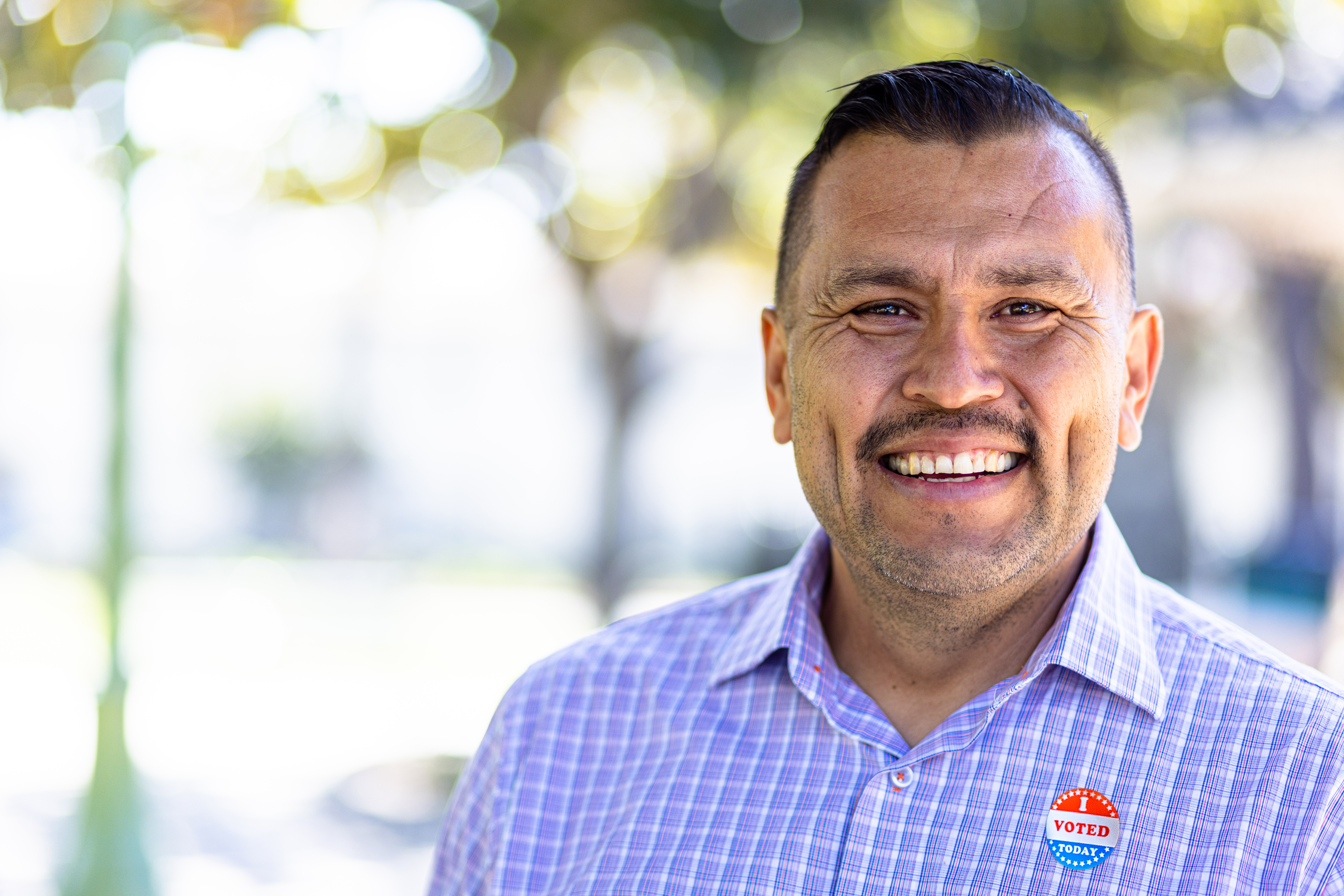 Mexican Man with I voted Sticker stock photo