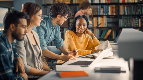 Class Of University Students Using Laptops In Lecture stock photo