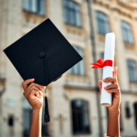 Cropped image of graduate holding academic hat and diploma with red ribbon. Happy graduation, bright future, success and confidence. stock photo