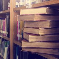 Stack book in shelf on library room stock photo