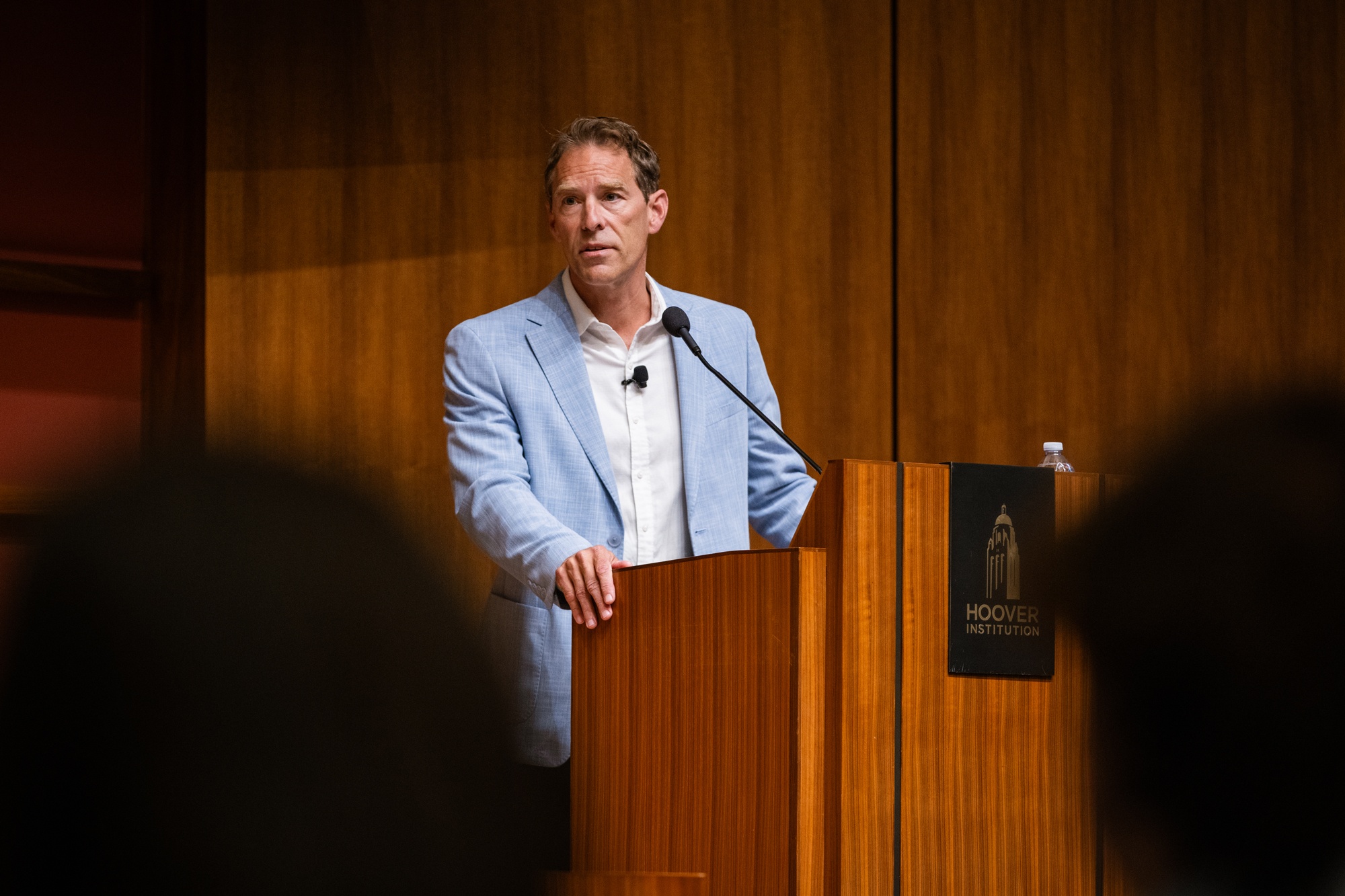 Senior Fellow Dominic Parker speaks at the 2025 HISPBC in Hauck Auditorium on August 12, 2025. (Patrick Beaudouin)