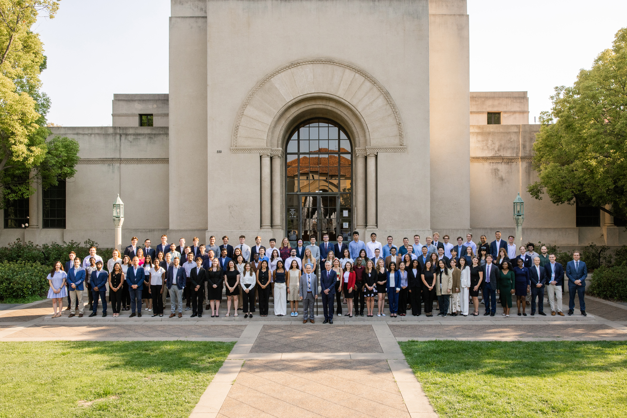 Students who participated in the 2025 Hoover Institution Summer Policy Boot Camp stand before Hoover Tower on August 10, 2025. (Patrick Beaudouin)