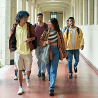 college students walking around istock