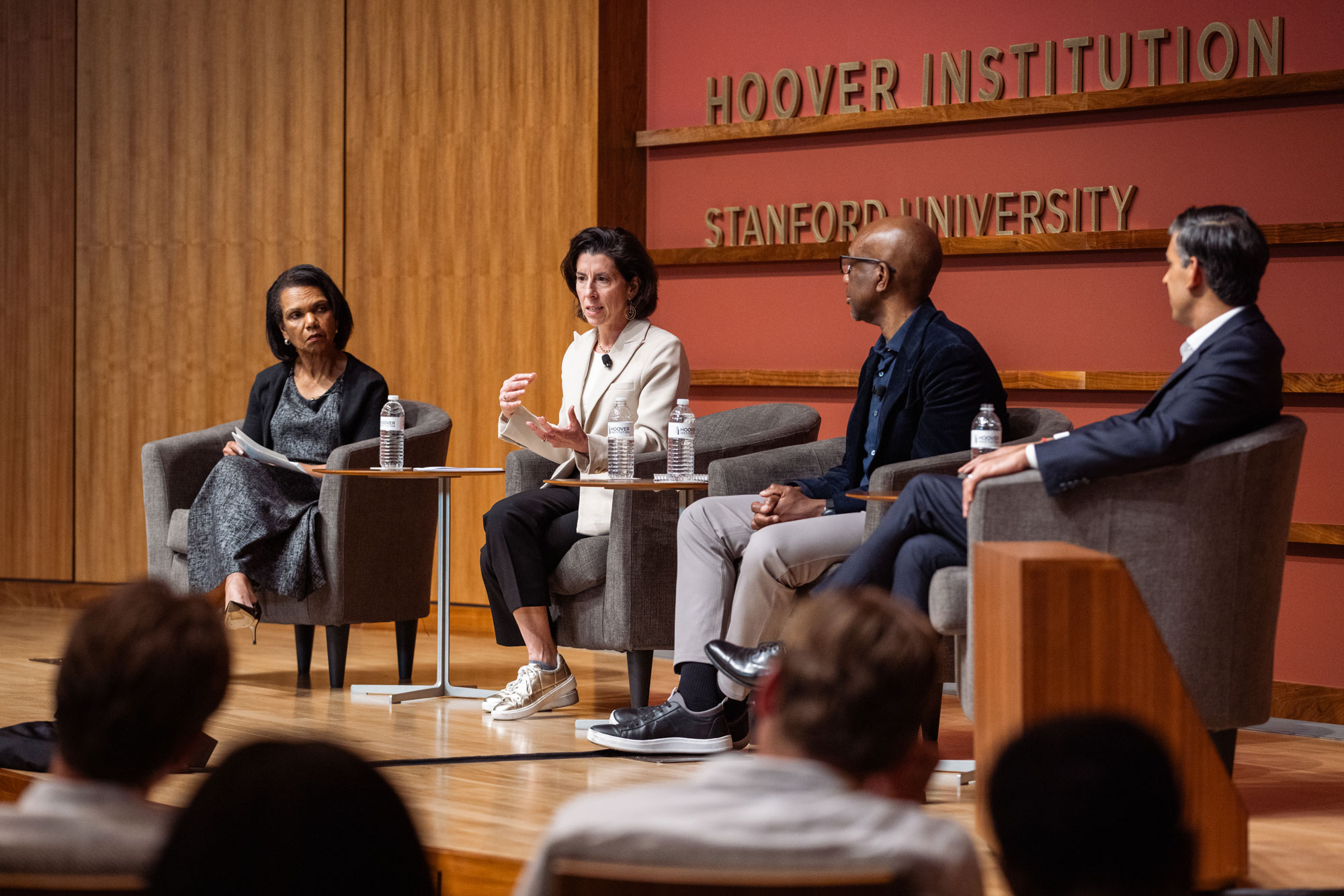 Hoover Institution Director Condoleezza Rice, Former US Commerce Secretary Gina Raimondo, Google-Alphabet executive James Manyika and Former UK Prime Minister and Hoover Distinguished Visiting Fellow Rishi Sunak are seen in Hauck Auditorium on March 17, 2026. (Patrick Beaudouin)
