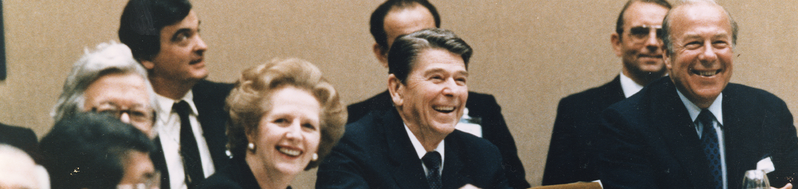 detail of a color photo showing Margaret Thatcher, Ronald Reagan, and George Shultz at the United Nations