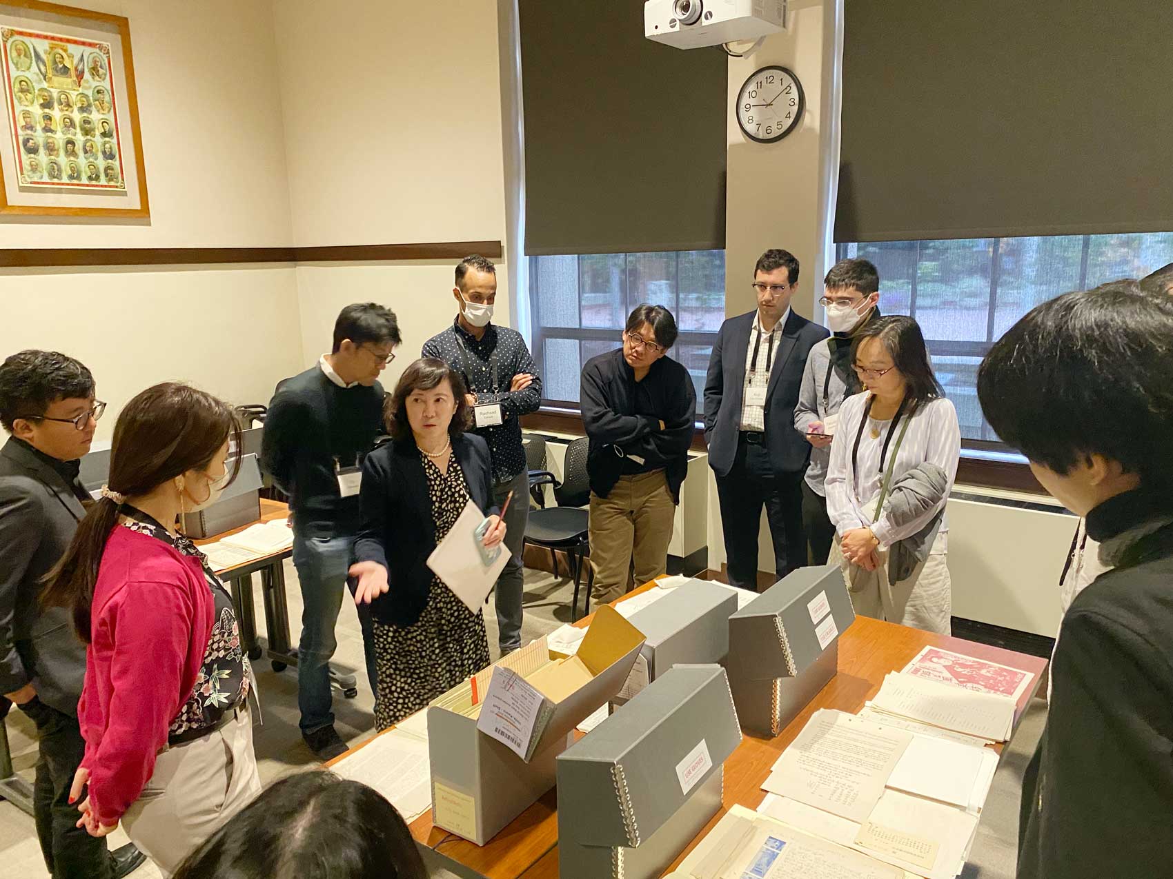 Group of workshop participants during L&A tour of collections led by Kay Ueda