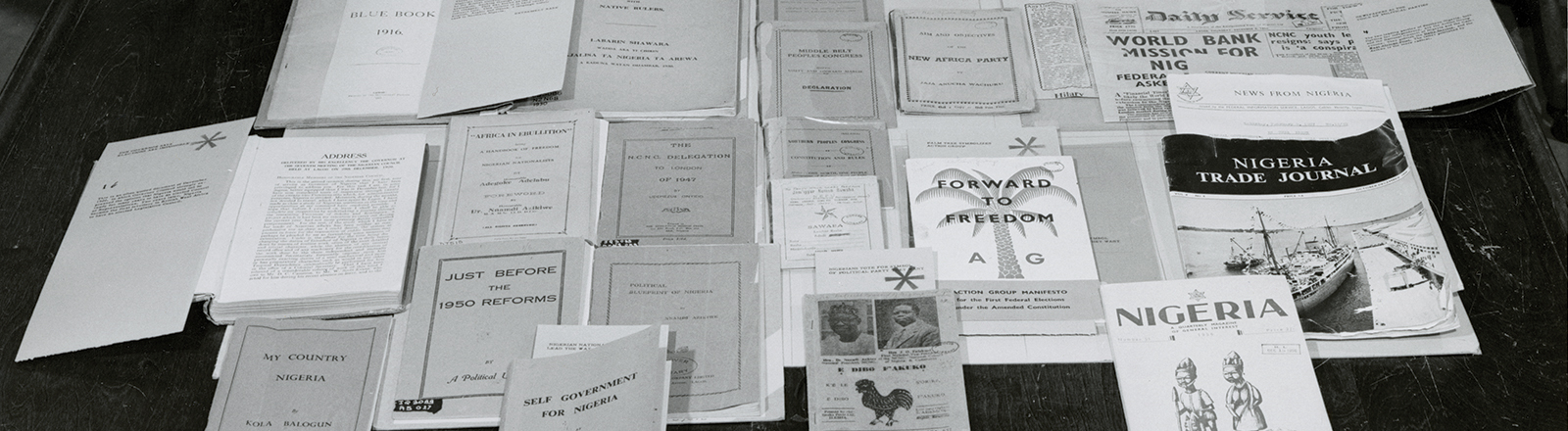A black and white photo of a display of Hoover library materials about Nigeria, circa 1960