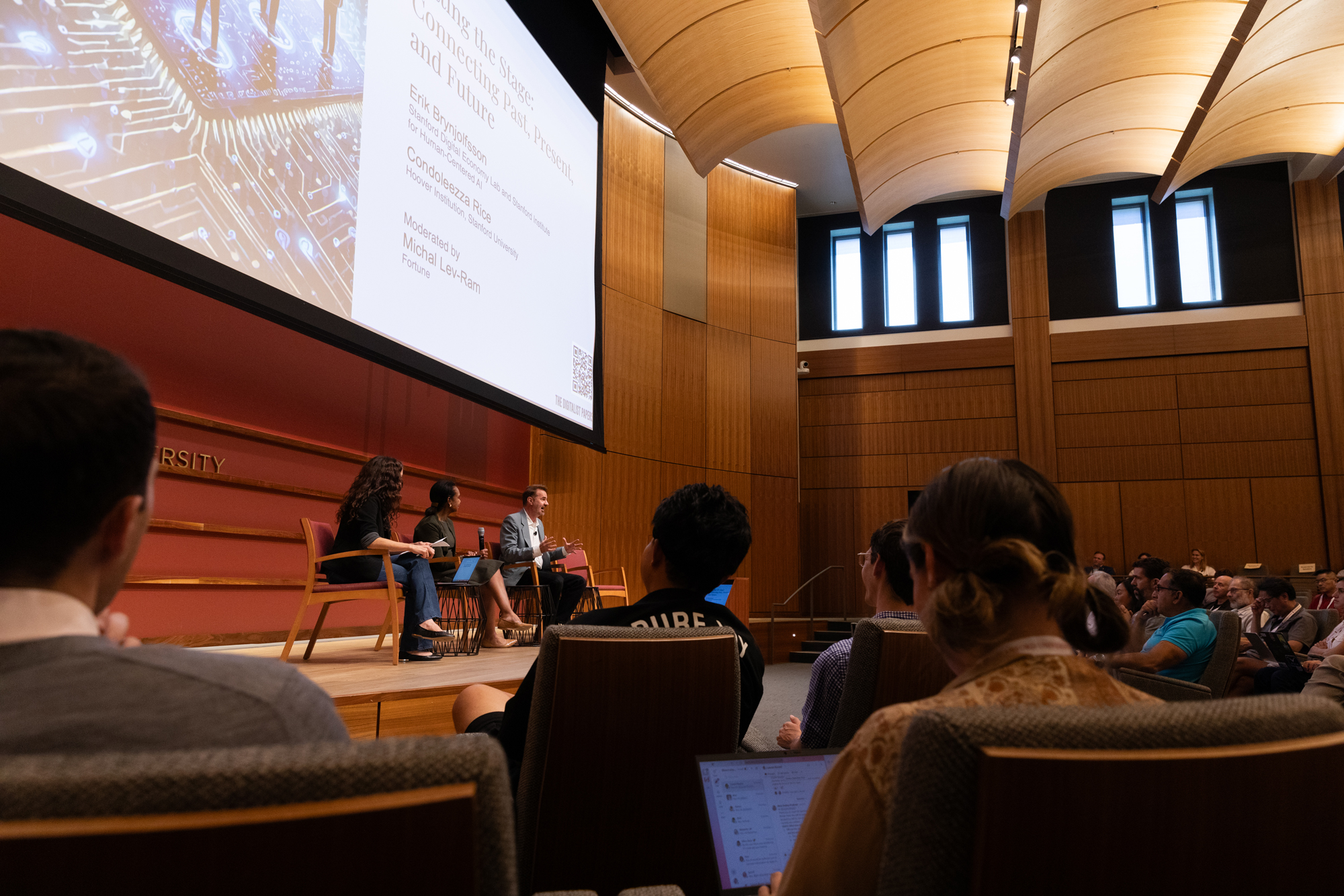 Attendees listen to Stanford’s Erik Brynjolfsson and Hoover Institution Director Condoleezza Rice speak about democracy and the rise of generative AI on September 24, 2024. (Patrick Beaudouin)