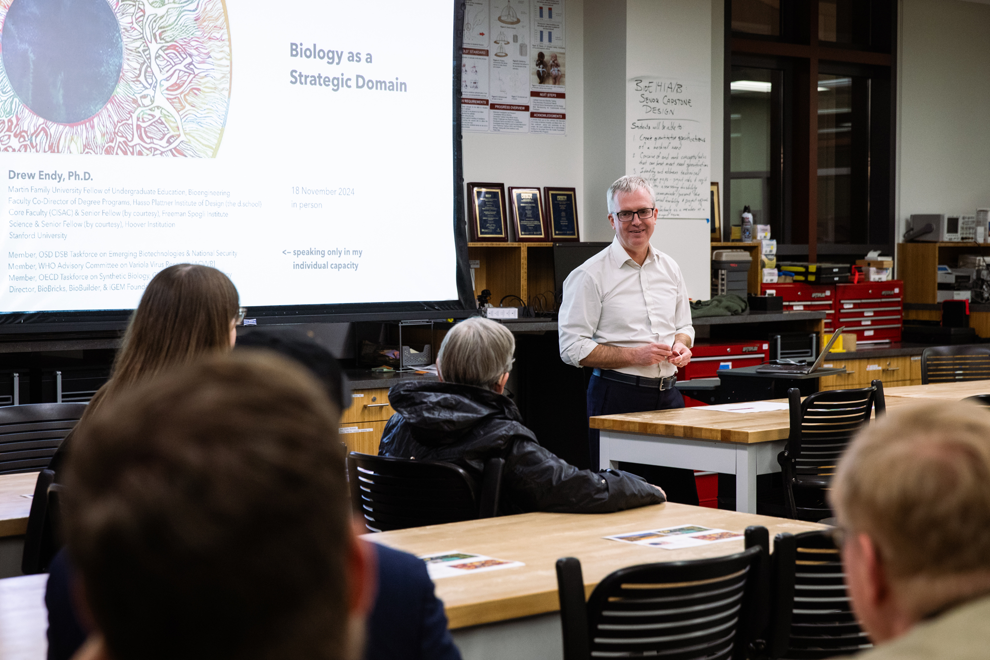 Senior Fellow Drew Endy speaks to state legislators in a Stanford laboratory about the value of synthetic biology to the United States on November 18, 2024. (Patrick Beaudouin)