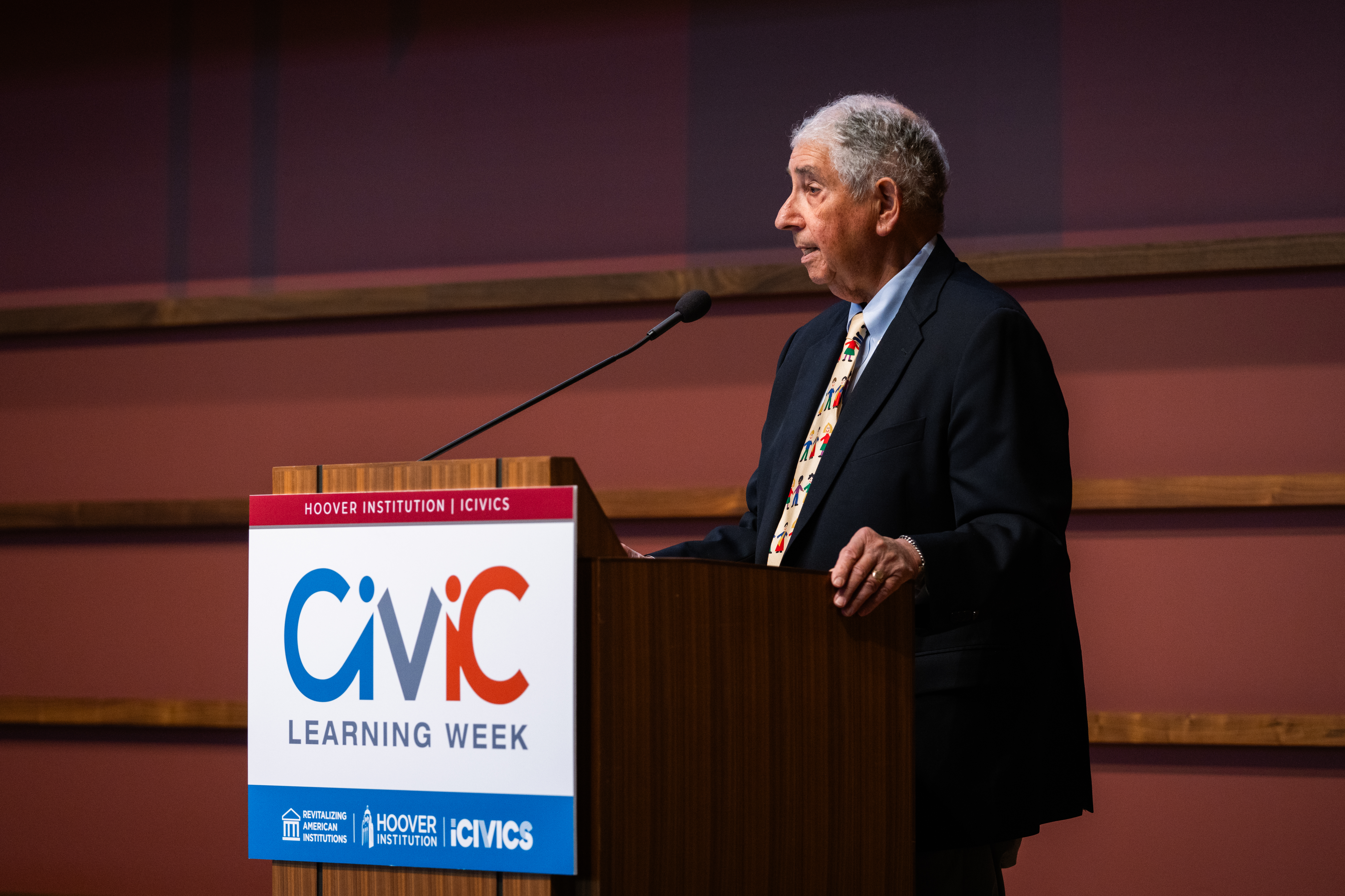 Hoover Senior Fellow Chester E. Finn Jr. speaks at the iCivics Civic Learning Week National Forum at the Hoover Institution on March 13, 2025. (Patrick Beaudouin)