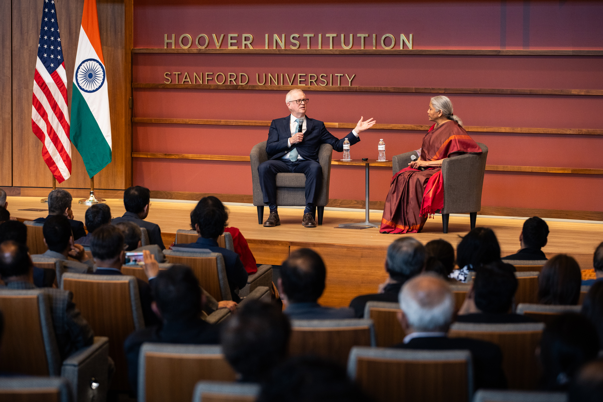 Senior Fellow Steven J. Davis and Indian Finance Minister Nirmala Sitharaman are seen in Hauck Auditorium on April 21, 2025. (Patrick Beaudouin)   