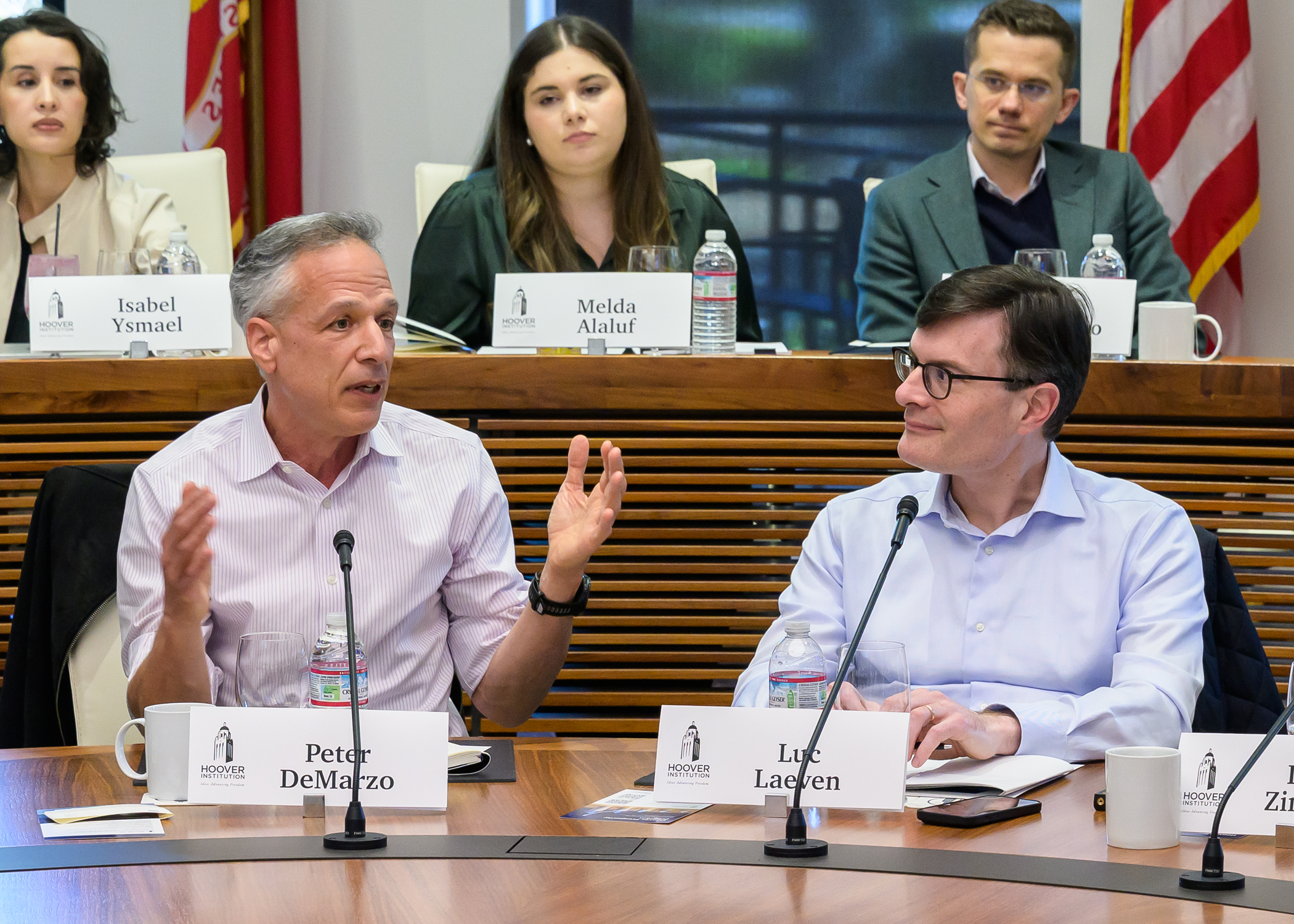 Peter DeMarzo (Stanford University) (left) presents on interest rate risk in banking. Luc Laeven (European Central Bank) (right) provided comments to DeMarzo's paper.
