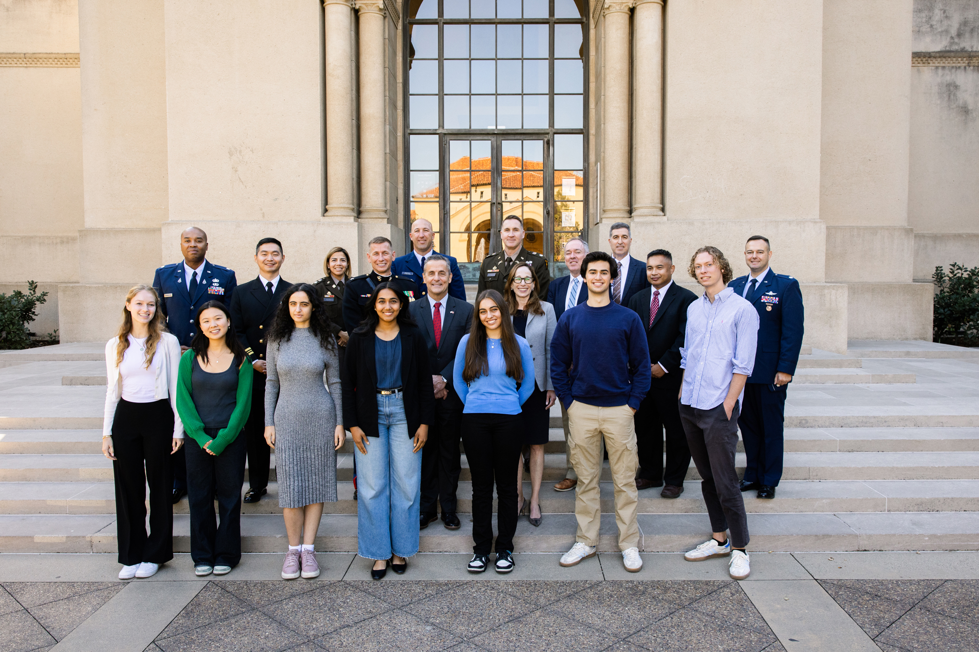 Hoover Senior Fellow Amy Zegart, Hoover National Security Affairs fellows and their mentees stand before Hoover Tower on November 8, 2024. (Patrick Beaudouin)