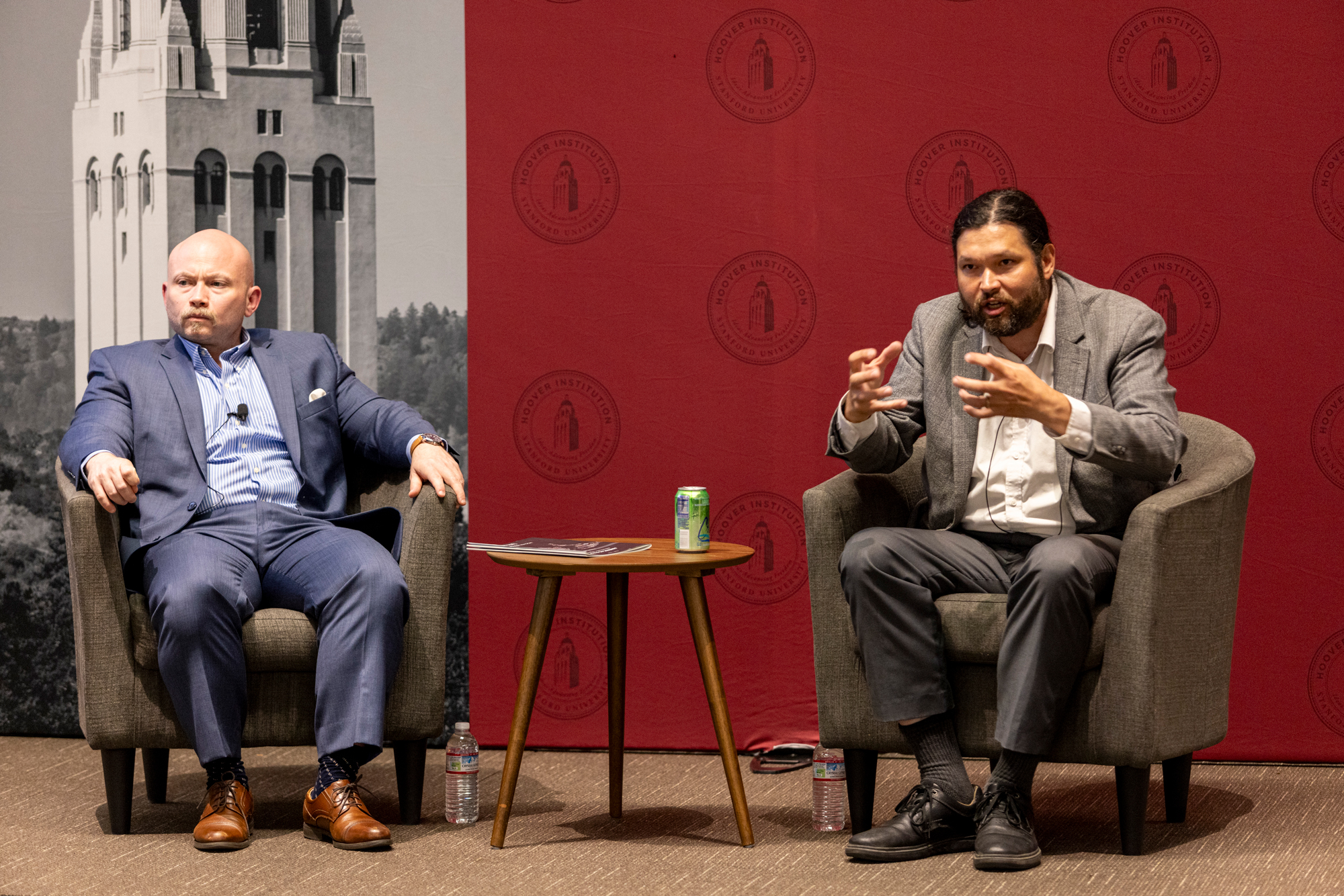 Hoover fellows Joseph Ledford (left) and Anthony Gregory speak in Stauffer Auditorium on October 1, 2025. (Daniel Beck)