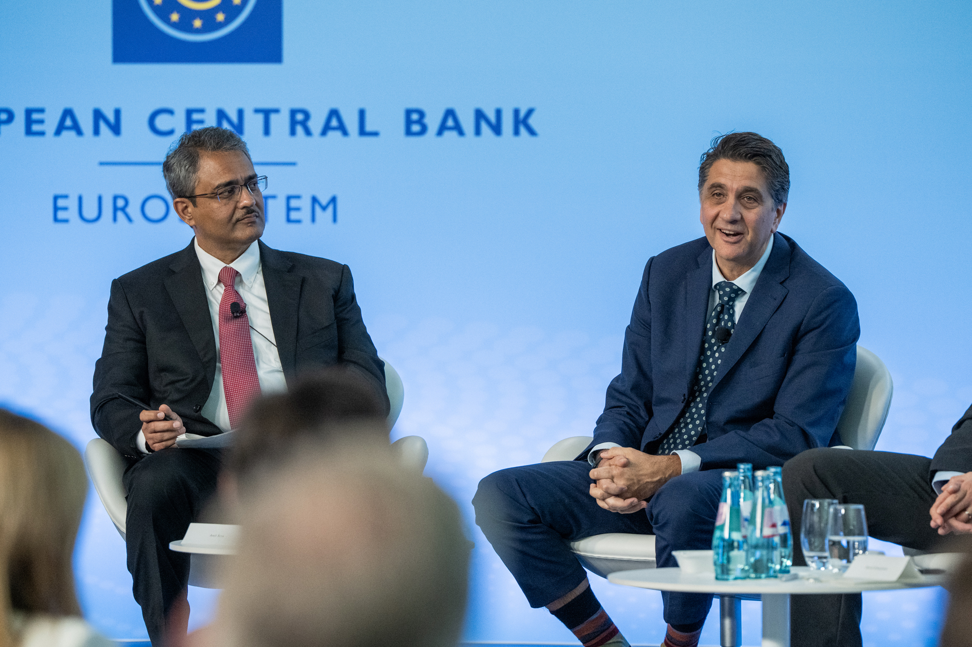 Senior Fellow Amit Seru (left), co-director of Hoover's Financial Regulation Working Group, chairs a panel on non-bank financial intermediaries, including Nicola Cetorelli (right), head of financial intermediation at the Federal Reserve Bank of New York. Photo credit: Andrej Hanzekovic/ECB