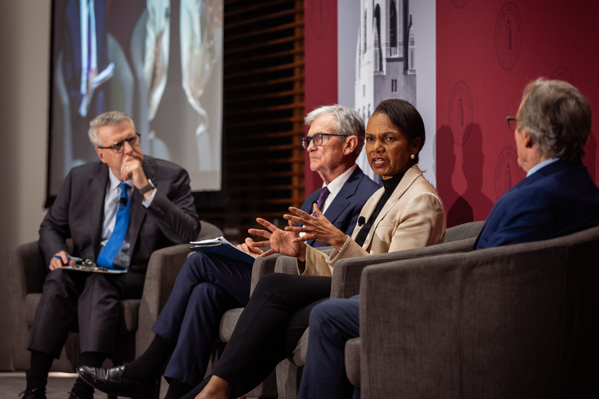 Hoover Institution Director Condoleezza Rice speaks alongside Federal Reserve Chairman Jerome Powell (left) in Shultz Auditorium on December 1, 2025. (Patrick Beaudouin)