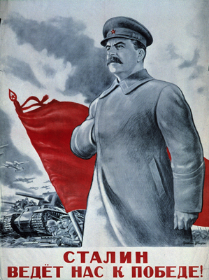 Poster print of Stalin standing in front of a red flag