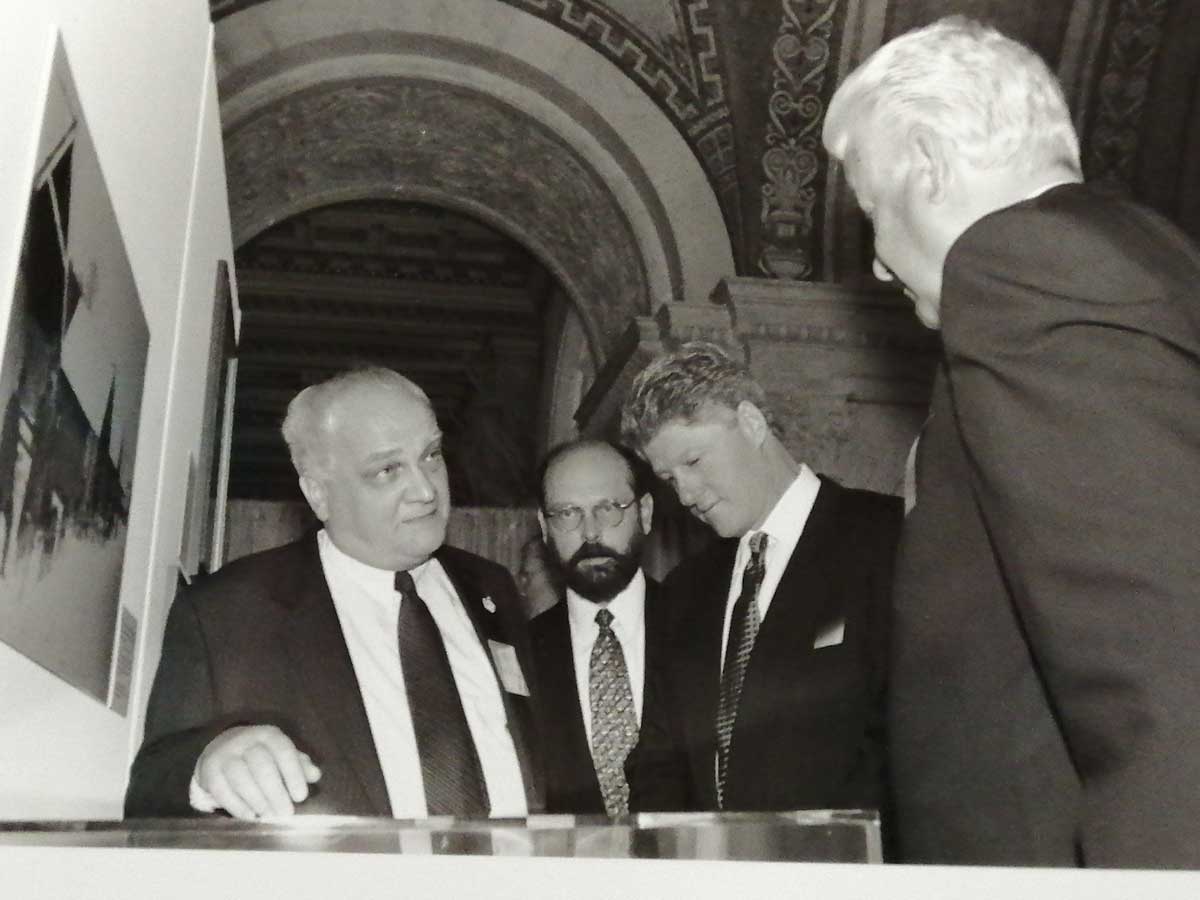 Black and white photo of Ivanov at left, with Clinton and Yeltsin at right.