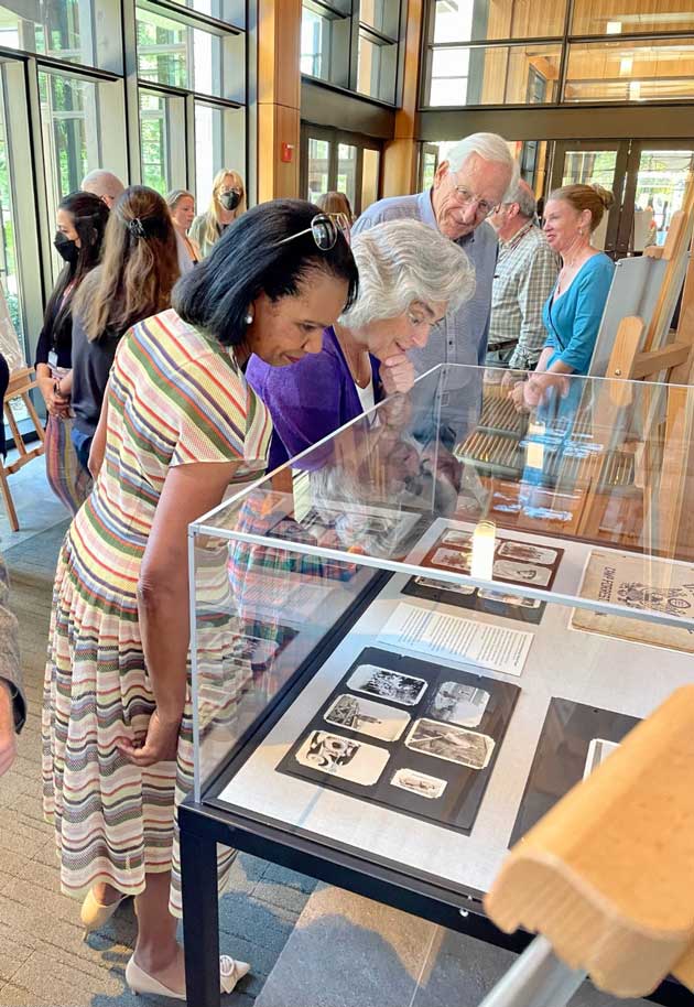 Condoleezza Rice and Persis Drell looking at an L&A exhibit during Juneteenth 2022 event