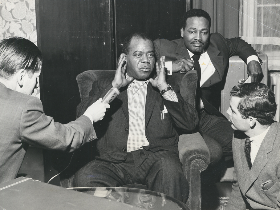 Louis Armstrong visits with Radio Liberty reporters