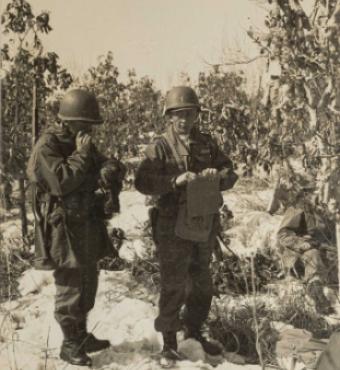 Rasula - sepia toned photo of 2 soldiers in the field