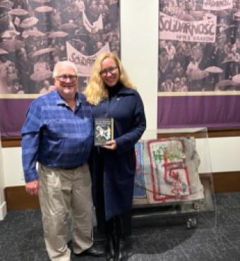 Richard Brown standing with Rebecca Donner in Hoover Tower Gallery