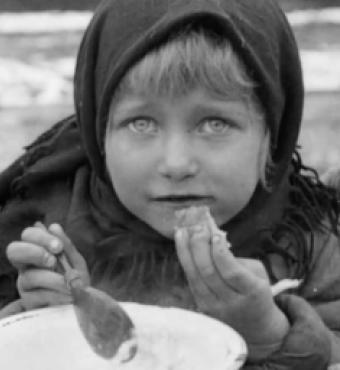 Screencapture of Tsaritsyn girl from film "America's Gift to Famine-Stricken Russia" (1922)