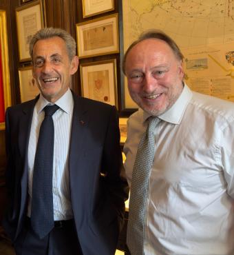 Carla Bruni, former French president Nicholas Sarkozy and Andrew Roberts are seen in London on June 4.