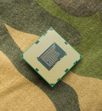 computer chip on camo background