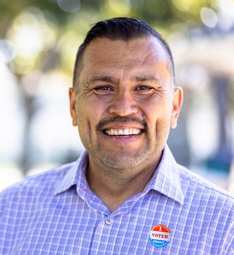 Mexican Man with I voted Sticker stock photo