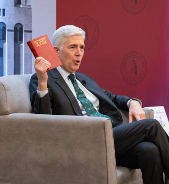 US Supreme Court Justice Neil Gorsuch holds up a copy of Herbert Hoover’s The Challenge to Liberty while speaking at the Hoover Institution’s Winter Board of Overseers meeting on February 24, 2025. 