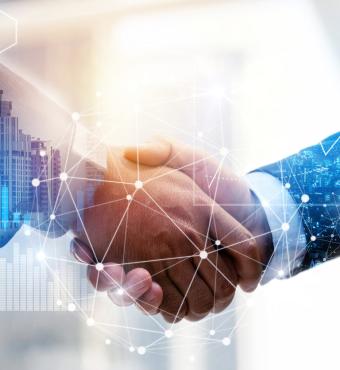 Business Partnership. business man investor handshake with effect global network link connection and graph chart of stock market graphic diagram, digital technology, internet and partnership concept stock photo