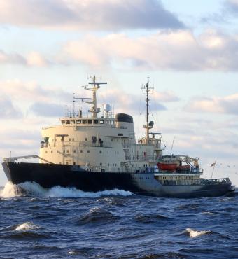 Soviet ice-breaker in open sea - stock photo