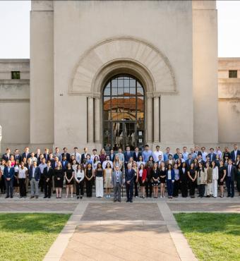 Students who participated in the 2025 Hoover Institution Summer Policy Boot Camp stand before Hoover Tower on August 10, 2025. (Patrick Beaudouin)
