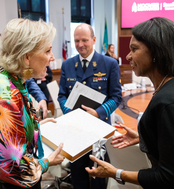 Hoover Institution Director Condoleezza Rice and Her Imperial and Royal Highness Princess Astrid of Belgium exchange a gift in the Annenberg Conference Room on October 7, 2025. (Patrick Beaudouin)