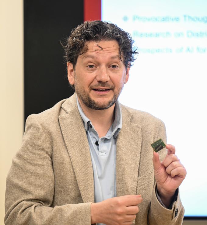 Simone D’Amico speaks to members of Congress and their staff members at an event at Stanford University on May 30, 2024. (Rod Searcey)